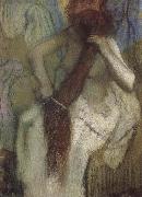 Edgar Degas The woman doing up her hair oil painting